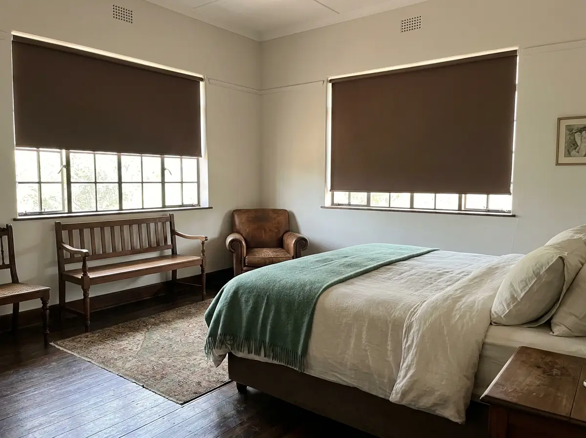 Bedroom with blockout blinds in a Parktown North heritage-style interior